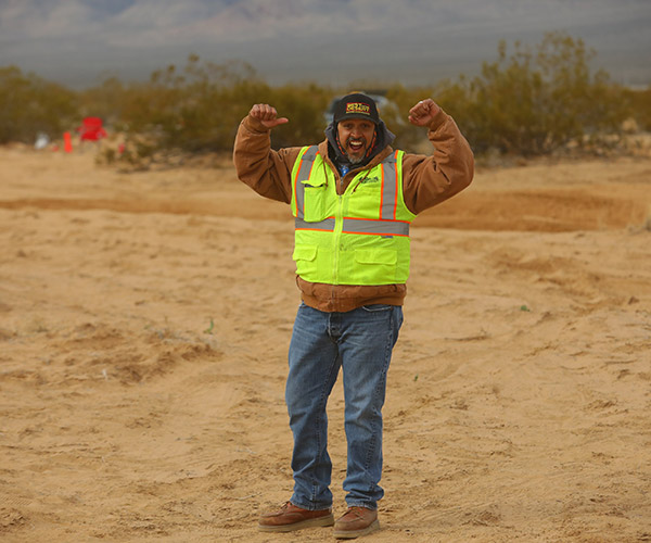 best in the desert volunteer working at off road race